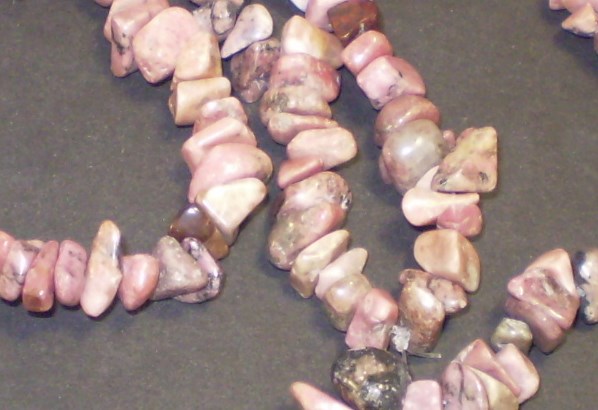 Rhodonite chip beads close up.